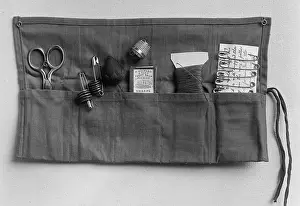 Sailor Prints: A simple sewing kit, provided to sailors by the Navy League of the U.S. Ca. 1905-1940