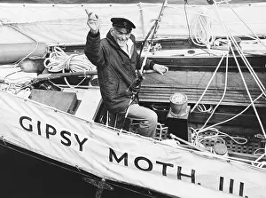 Yacht Prints: Sir Francis Chichester, long-distance yachtsman on the Gipsy Moth III in New York Harbor