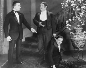 Butler Prints: SLIPPING WIVES, from left: Herbert Rawlinson, Oliver Hardy, Stan Laurel, 1927