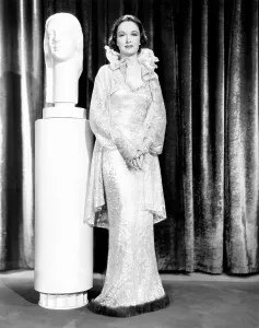 Lace Dress Prints: SMART GIRL, Gail Patrick, in a white satin and silver lace dress with sable trim, 1935