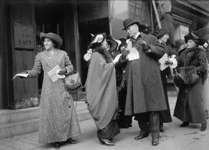 19th Amendment Prints: Smiling women suffragists hand out literature to advertise the 1913 parade in New York City