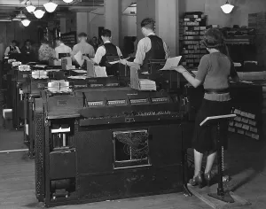 Progress Prints: Social Security Administration clerks seated at massive tabulating machines