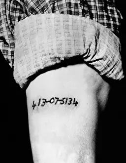 Records Prints: Social Security number tattooed onto an arm