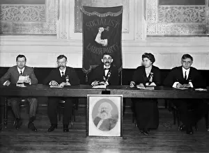 Hammer Prints: Socialist Labor Party posed with a portrait of Karl Marx