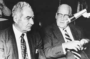 Investigation Prints: Sol Adoff (left) speaks with his lawyer John Toolan during testimony. June 24, 1970