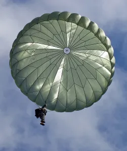 Parachutes Prints: Soldier of the 82nd Airborne descends from a parachute drop over the Klute Drop Zone in Beach Hill West Virginia
