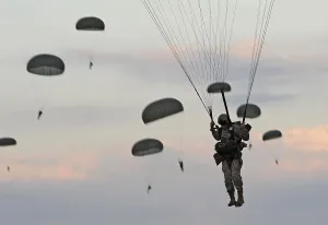 Parachutes Prints: Soldiers of the 82nd Airborne descend from a parachute drop during training at Fort Bragg North Carolina