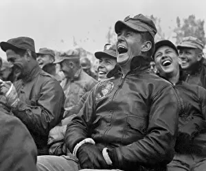 Movie Stars Prints: Soldiers laughing to the Bob Hope show at Seoul, Korea. Oct. 23, 1950. (BSLOC_2014_13_203)