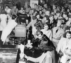 Social Life Prints: Soldiers on leave with young women in a crowded soda fountain