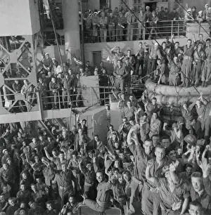 Mediterranean Sea Prints: Soldiers of the U.S. 143rd Infantry cheer Italy's unconditional surrender to Allied Nations