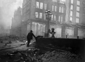 Cityscape Prints: A solitary man walks in the ruins after the April 18