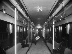 Newspapers Prints: Solitary passenger in a commuter train in the new Holland Tunnel under the Hudson River connecting New York City