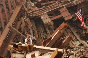 Fireman Prints: Solo firefighter sitting on a beam in the wreckage of the World Trade Center