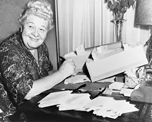 Vaudeville Prints: Sophie Tucker (1884-1966), at her desk attending to her mail in 1952