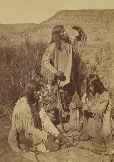 Young Men Prints: Southern Paiute Indians kindle fire by friction, 1874, in this photo by John K. Hillers
