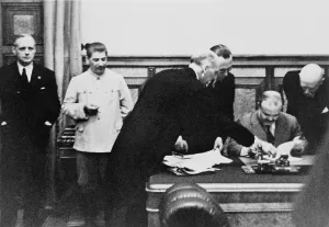 Molotov Prints: Soviet Foreign Minister Molotov signs the Nazi-Soviet Nonaggression Pact in the Kremlin on August 23