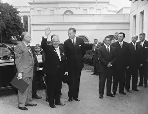 Lcgr1412 Prints: Soviet Premier Nikita Khrushchev waves as he arrives at the White House