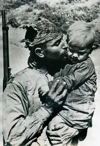Spain. Civil War. Republican peasant saying goodbye to his son before leaving to front. SPAIN. Salamanca. Archivo Histrico Nacional. AISA/Everett Collection**US SALES ONLY**