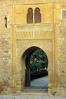 SPAIN. Granada. Alhambra. Puerta del Vino (Door of Wine) in the Alzacaba and palace area. Hispano-Moresque art. Nasrid dynasty. Architecture