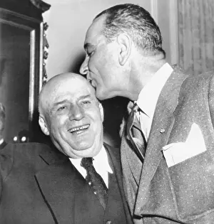 Rayburn Prints: Speaker Sam Rayburn gets a kiss on the head from Senate Majority Leader Lyndon Johnson