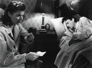 Sitting In Chair Prints: SPELLBOUND, Ingrid Bergman, Gregory Peck, 1945