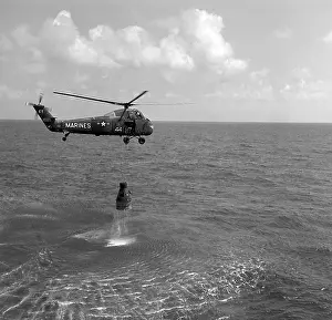 Shepard Prints: After splashdown recovery of the Freedom 7 space capsule by a U.S. Marine helicopter