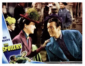 Atcmposterart Prints: THE SPOILERS, from left: Margaret Lindsay, John Wayne, lobbycard, 1942