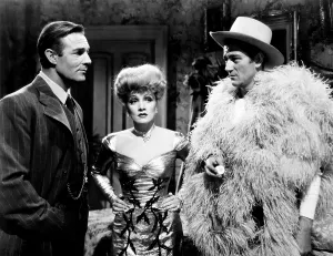 Drag Prints: THE SPOILERS, from left, Randolph Scott, Marlene Dietrich, John Wayne, 1942