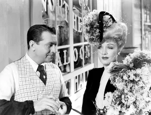 Feathered Hat Prints: THE SPOILERS, from left, Richard Barthelmess, Marlene Dietrich, 1942