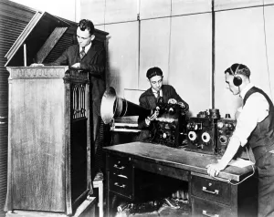 Testing Prints: Staff of 8MK Detroit News testing a radio