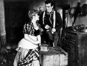 Coffee Pot Prints: STAGECOACH, from left, Claire Trevor, John Wayne, 1939