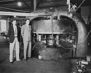 Physicists Prints: Stanley Livingston (left) and Ernest Lawrence with the 27-inch cyclotron in 1934