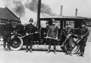 Seven People Prints: State troopers with riot guns await duty at Farrell