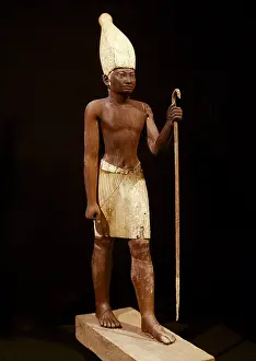 Statue of Sesostris I. 1971 -1928 BC. The Pharaoh appears here with a White Crown from the Upper Egypt. Painted cedarwood. Egyptian art. Middle Kingdom. Sculpture on wood. EGYPT