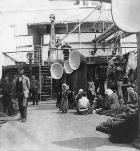 Steamers Prints: Steerage passengers taking life easy on an ocean liner