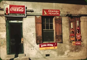Coca Cola Prints: A store or cafe with soft drink signs: Coca-Cola