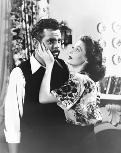 Hand On Face Prints: THE STRANGER, from left: Orson Welles, Loretta Young, 1946