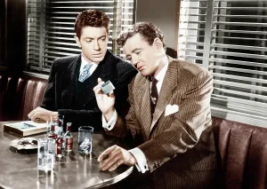 Smoking Prints: STRANGERS ON A TRAIN, from left: Farley Granger, Robert Walker, 1951