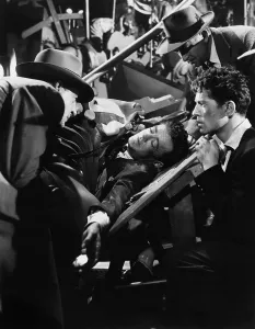 Death Prints: STRANGERS ON A TRAIN, Robert Walker (center)