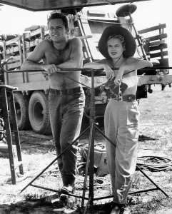 Freeman Prints: STREETS OF LAREDO, from left: William Holden, Mona Freeman, on set, 1949