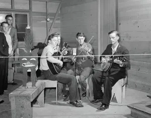 Images Dated 5th August 2014: String band playing at Saturday night dance with a kitty for contributions
