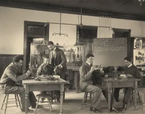 Hampton Prints: Students constructing telephones at Hampton Institute