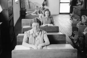 Hair Styles Prints: Students of various ages seated at their desks in a rural Wisconsin school. Sept. 1939