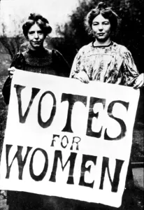 Suffrage Prints: Suffragettes at turn of the last century holding Votes for Women picket sign