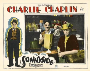 Classic Prints: SUNNYSIDE, on left border: Charles Chaplin (aka Charlie Chaplin'); in scene on right: Charles Chaplin (man on left)