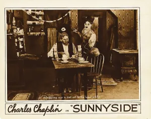 Serving Prints: SUNNYSIDE, from left: Tom Wilson, Charlie Chaplin, 1919