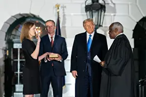 Thomas Prints: Supreme Court Associate Justice Clarence Thomas swears in Judge Amy Coney Barrett as a fellow Supreme Court Associate