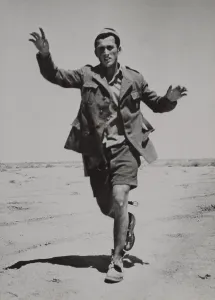Libya Prints: Surrendering Italian infantryman running towards a British patrol in Libya
