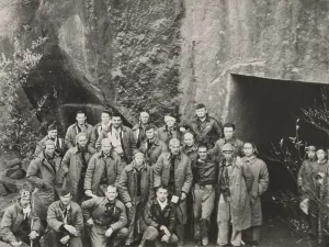 Doolittle Prints: Survivors of General Jimmy Doolittle's Tokyo Raiders outside a shelter carved from a mountainside somewhere