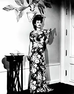 Prints of ABOVE SUSPICION, Joan Crawford, in a red and white gown by Irene, 1943 October Prints: ABOVE SUSPICION, Joan Crawford, in a red and white gown by Irene, 1943